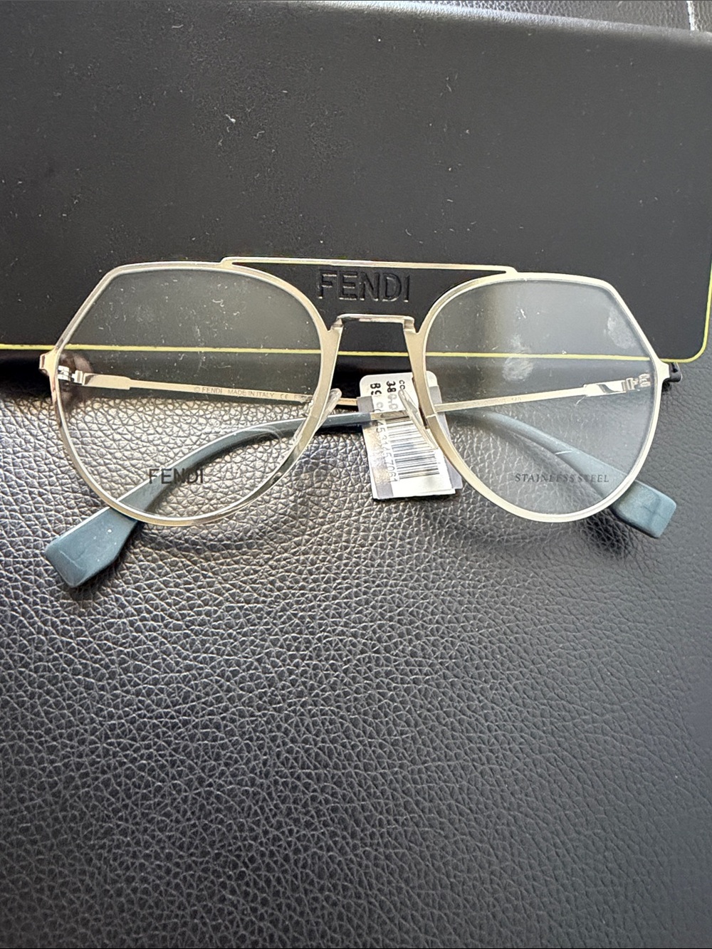 Fendi Men’s Silver Metal Frame Glasses with Light Blue Temple Tips